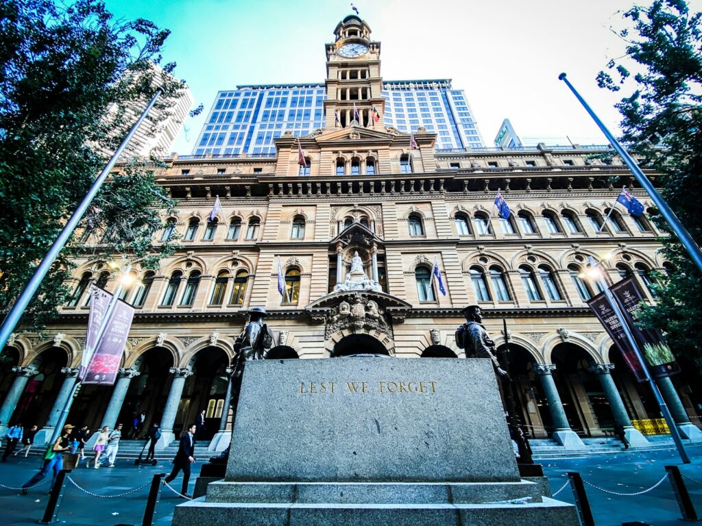 A large building with a clock tower in the middle of it